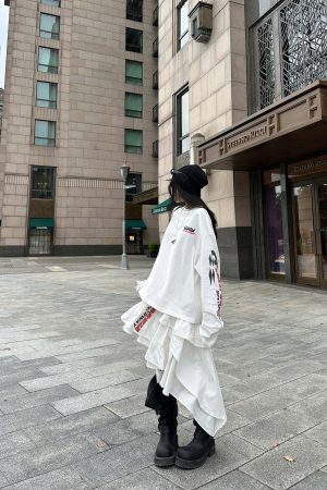 WARDEN EDGE Asymmetric Layered Skirt with Ruffle Detail