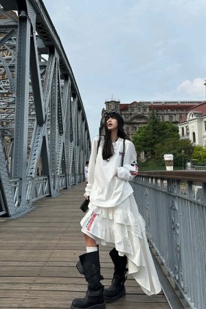 WARDEN EDGE Asymmetric Layered Skirt with Ruffle Detail