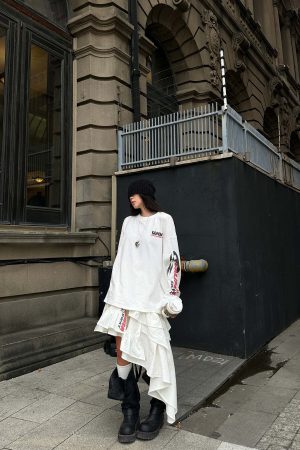 WARDEN EDGE Asymmetric Layered Skirt with Ruffle Detail