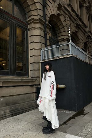 WARDEN EDGE Asymmetric Layered Skirt with Ruffle Detail