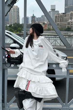 WARDEN EDGE Asymmetric Layered Skirt with Ruffle Detail