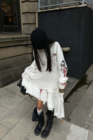 WARDEN EDGE Asymmetric Layered Skirt with Ruffle Detail