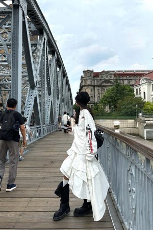 WARDEN EDGE Asymmetric Layered Skirt with Ruffle Detail