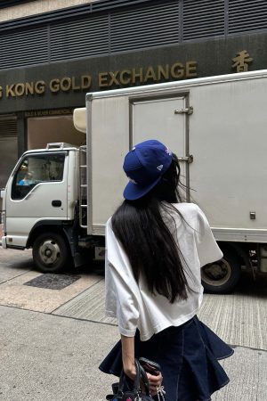 WARDEN EDGE Asymmetric Pleated Denim Mini Skirt with Built-in Shorts