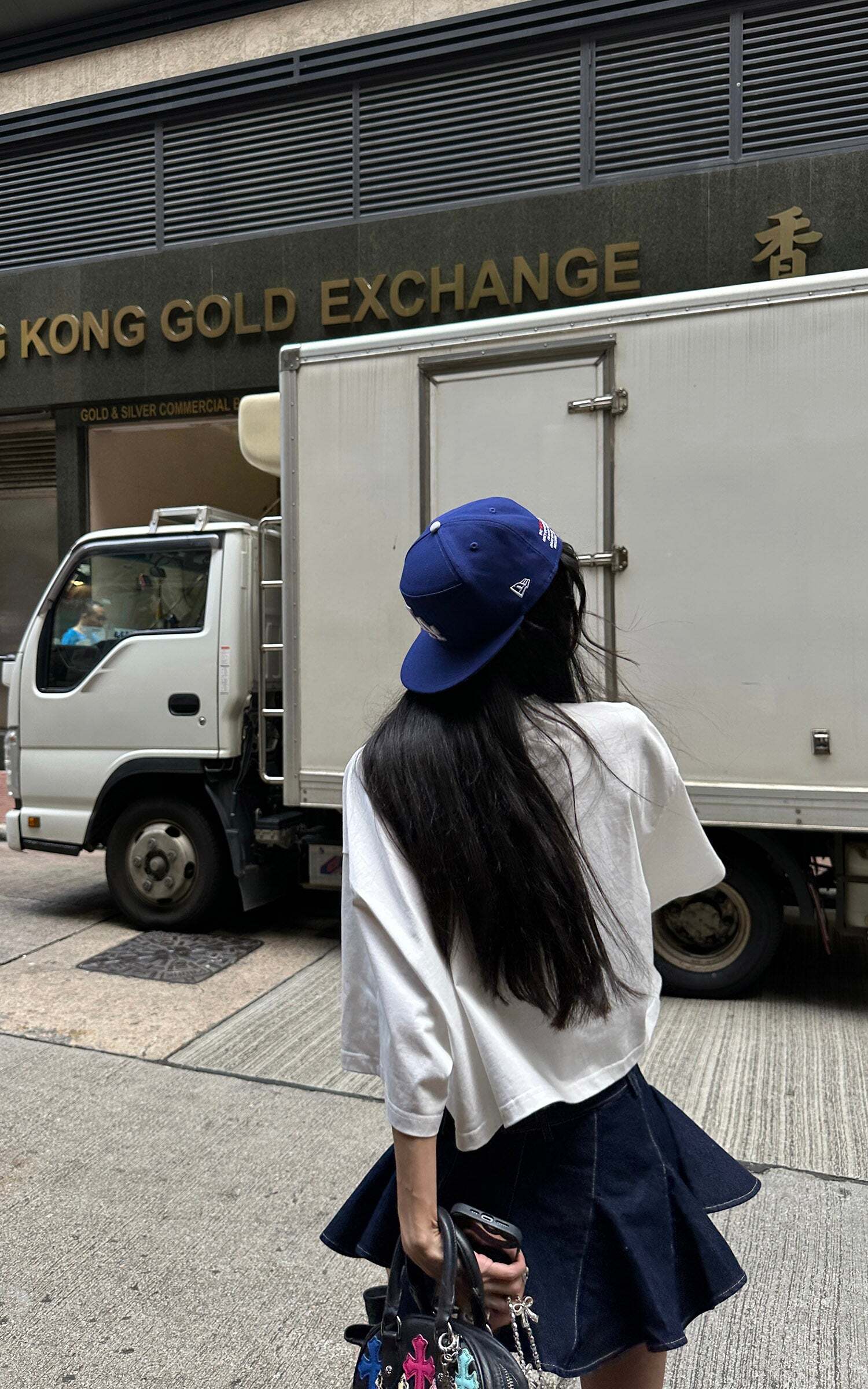 WARDEN EDGE Asymmetric Pleated Denim Mini Skirt with Built-in Shorts WARDEN EDGE Asymmetric Pleated Denim Mini Skirt with Built-in Shorts