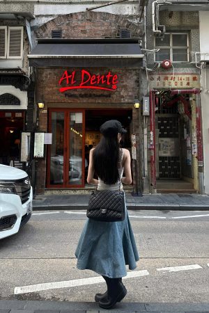 WARDEN EDGE Asymmetric Pocket Flare Denim Skirt with Deconstructed Belt Detail