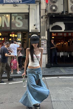 WARDEN EDGE Asymmetric Pocket Flare Denim Skirt with Deconstructed Belt Detail