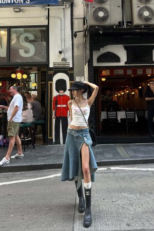 WARDEN EDGE Asymmetric Pocket Flare Denim Skirt with Deconstructed Belt Detail