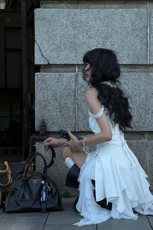 WARDEN EDGE Asymmetric Ruffled Mini Dress with Corset Detailing and Off-Shoulder Straps