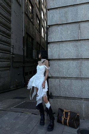 WARDEN EDGE Asymmetric Ruffled Mini Dress with Corset Detailing and Off-Shoulder Straps