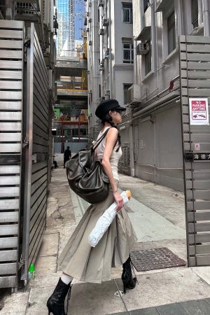 WARDEN EDGE Asymmetrical vest with skirt & pleated skirt set