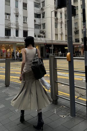 WARDEN EDGE Asymmetrical vest with skirt & pleated skirt set