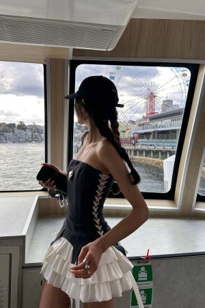 WARDEN EDGE Corset Dress with Tiered Pleated Hem and Side Lace-Up Detail