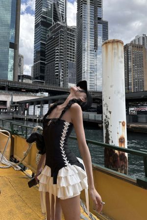 WARDEN EDGE Corset Dress with Tiered Pleated Hem and Side Lace-Up Detail