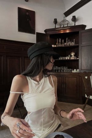 WARDEN EDGE Cutout Layered Tank Top with Asymmetric Hem