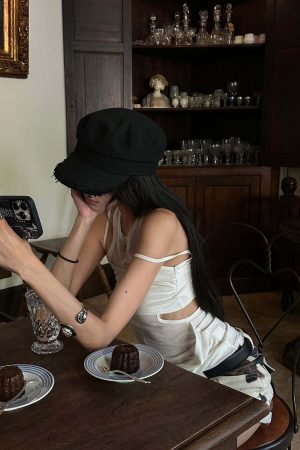 WARDEN EDGE Cutout Layered Tank Top with Asymmetric Hem