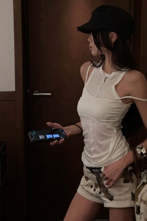 WARDEN EDGE Cutout Layered Tank Top with Asymmetric Hem