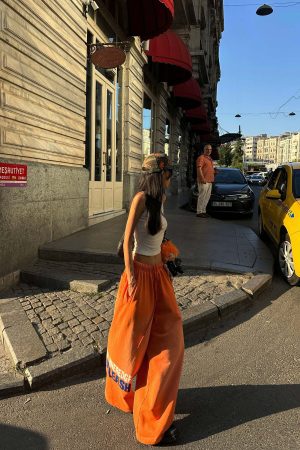 WARDEN EDGE Gradient Wide-Leg Pants with Bold Print