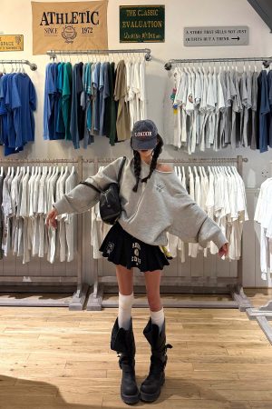 WARDEN EDGE Graphic Pleated Mini Skirt