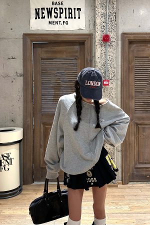 WARDEN EDGE Graphic Pleated Mini Skirt