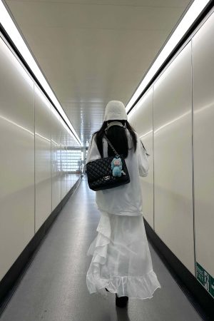 WARDEN EDGE Layered Asymmetric Midi Skirt in Mixed Textures