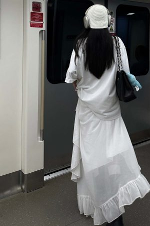 WARDEN EDGE Layered Asymmetric Midi Skirt in Mixed Textures