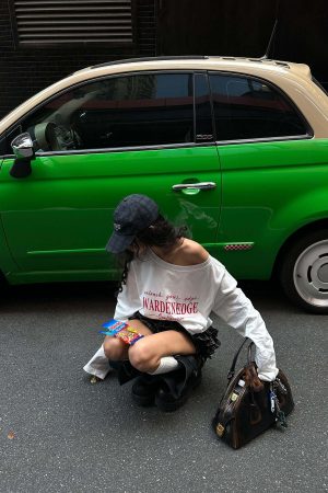 WARDEN EDGE Off-Shoulder Cropped Long Sleeve Tee with Asymmetric Hem