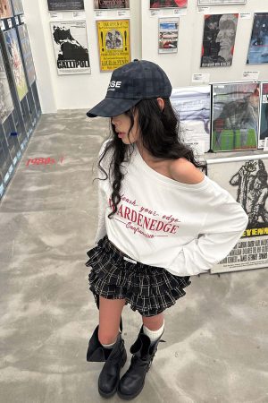 WARDEN EDGE Off-Shoulder Cropped Long Sleeve Tee with Asymmetric Hem