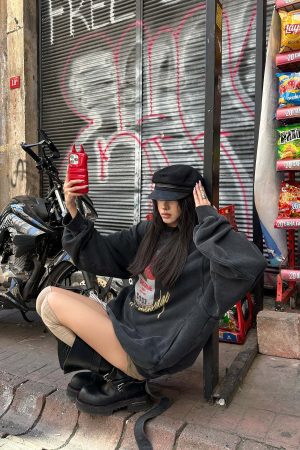 WARDEN EDGE Oversized Graphic Sweatshirt with Vintage Campbell Print and Strap Hem Detail