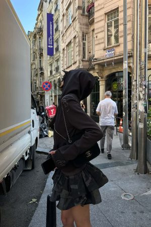 WARDEN EDGE Studded Zip-Up Hoodie with Spiral Embellishments and Extended Sleeves