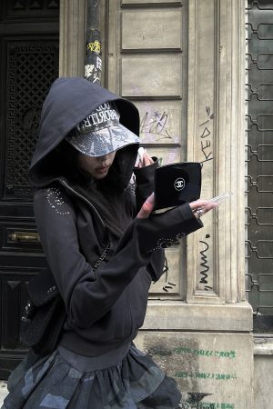 WARDEN EDGE Studded Zip-Up Hoodie with Spiral Embellishments and Extended Sleeves